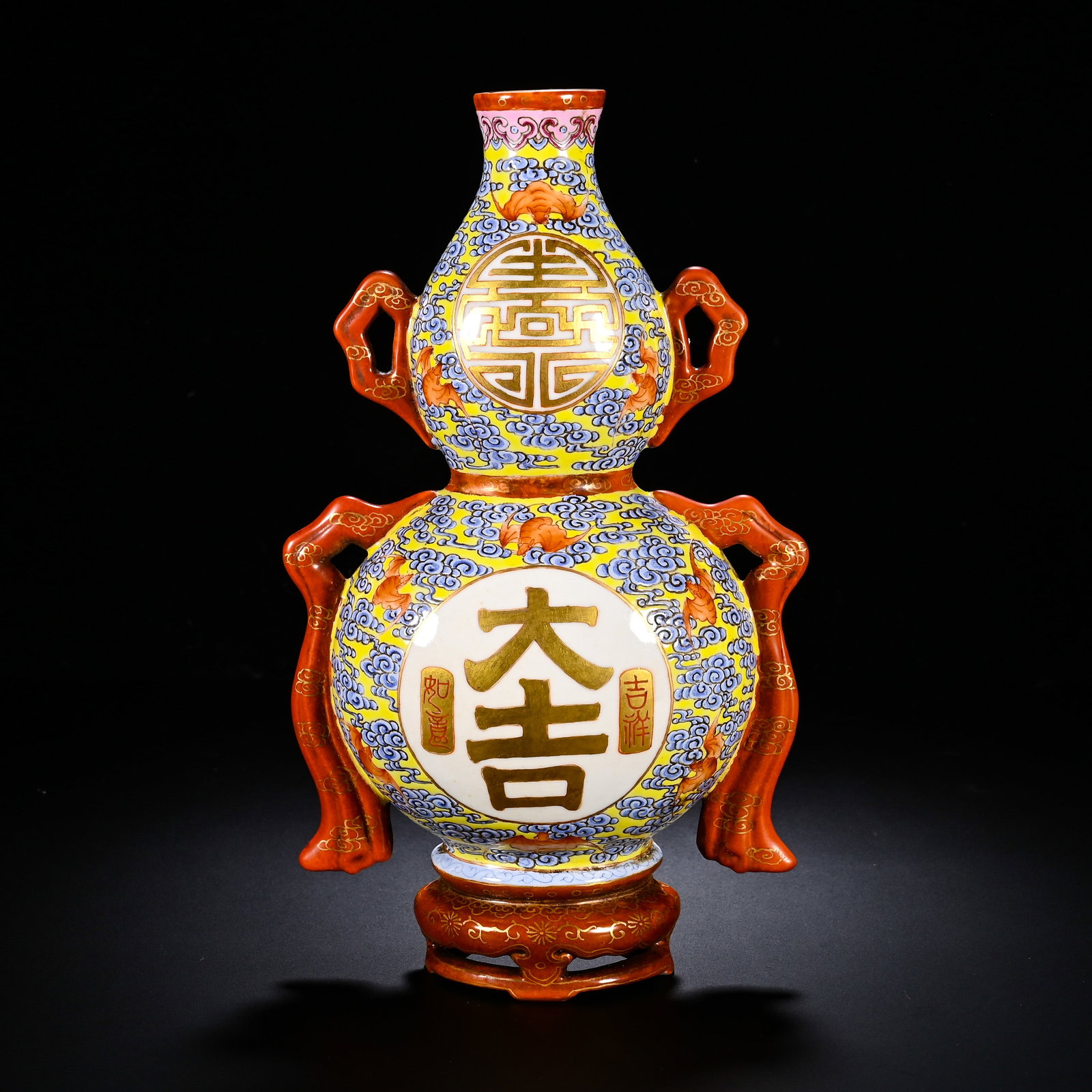 QING DYNASTY QIANLONG PASTEL YELLOW GROUND CLOUD BAT DOUBLE-EARED WALL VASE: QING DYNASTY QIANLONG PASTEL YELLOW GROUND CLOUD BAT DOUBLE-EARED WALL VASE. Height:20.8cm(8.19in), Width:12cm(4.72in)Hulu-shaped wall-vase for wall-mounting. Bright-yellow ground densely decorated wi
