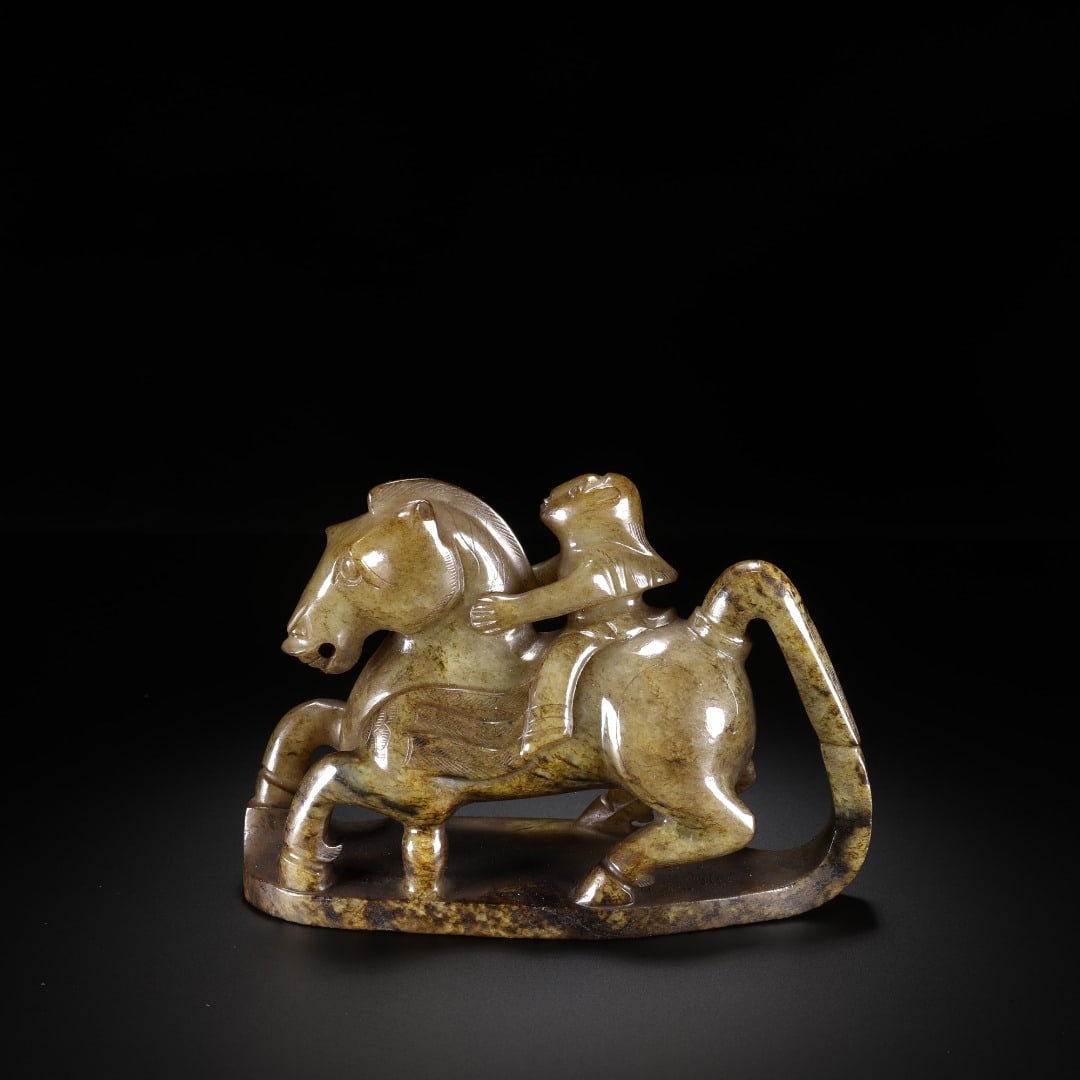 HAN DYNASTY HETIAN JADE HORSEMAN: HAN DYNASTY HETIAN JADE HORSEMAN. Long:11cm(4.33in), Width:4.5cm(1.77in), Height:7.8cm(3.07in), Weight:336g (0.741lb)Ancient jade ornament of feathered immortal riding horse. Fully carved from Hetian 