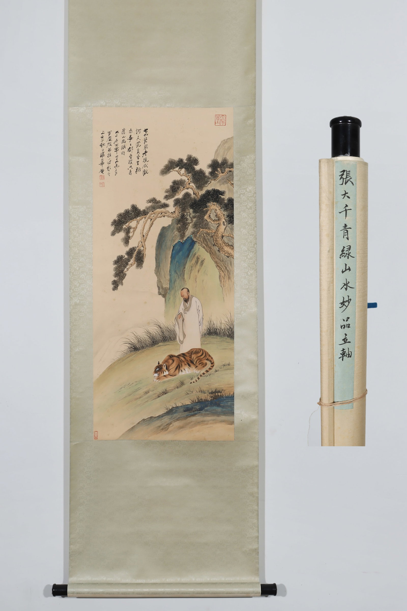 ZHANG DAQIAN (1899-1983) GREEN AND BLUE LANDSCAPE: ZHANG DAQIAN (1899-1983) GREEN AND BLUE LANDSCAPE. Long:96cm(37.80in) Width:40cm(15.75in)Figure landscape scroll on paper. The work depicts scholar, pine and tiger, rendered in tranquil elegant