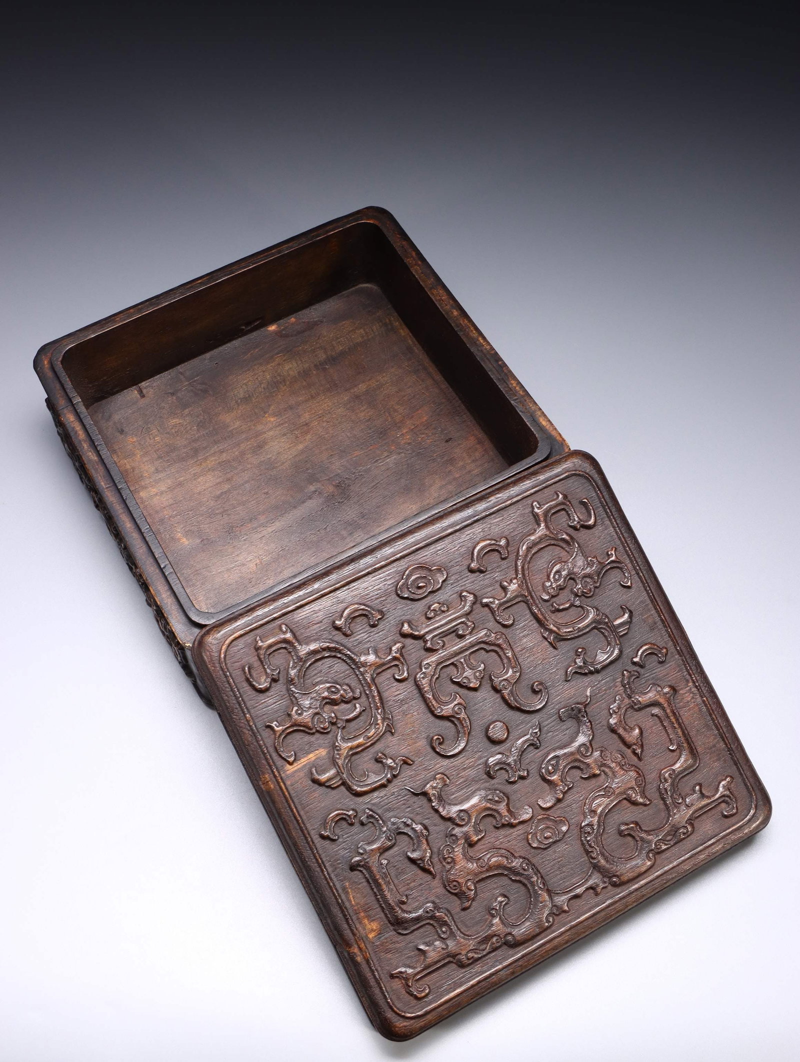 An Agarwood Covered Box: An Agarwood Covered Box. Dimensions: 3.82in x 8.07in x 8.07in; Weight: 1.65lbs.