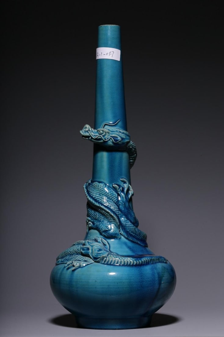 A Blue Glazed Long-Neck Vase: A Blue Glazed Long-Neck Vase. Height: 13.78in.