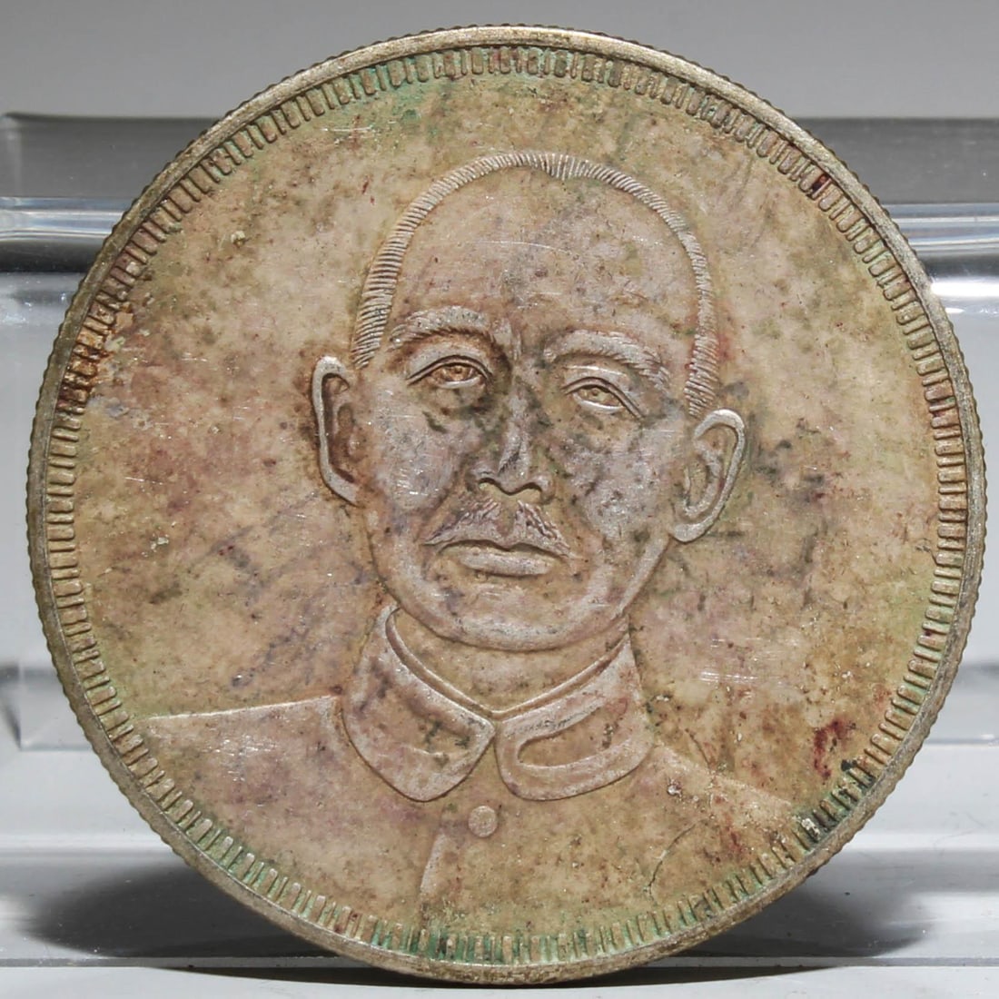 A Silver Coin: A Silver Coin. Diameter: 1.5". Weight: 26.6g
