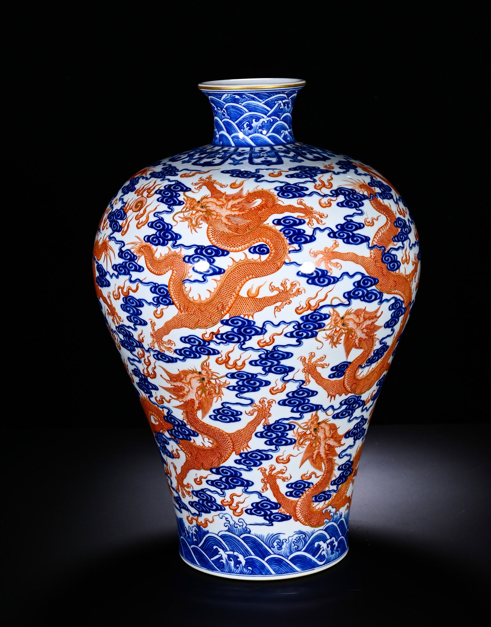 QING DYNASTY QIANLONG BLUE AND WHITE ALUM RED GILDED NINE-DRAGON PATTERN PLUM VASE: QING DYNASTY QIANLONG BLUE AND WHITE ALUM RED GILDED NINE-DRAGON PATTERN PLUM VASE. Height:38cm(14.96in), Diameter:23cm(9.06in)This is a Qianlong-period blue-and-white iron-red gilded meiping with nin