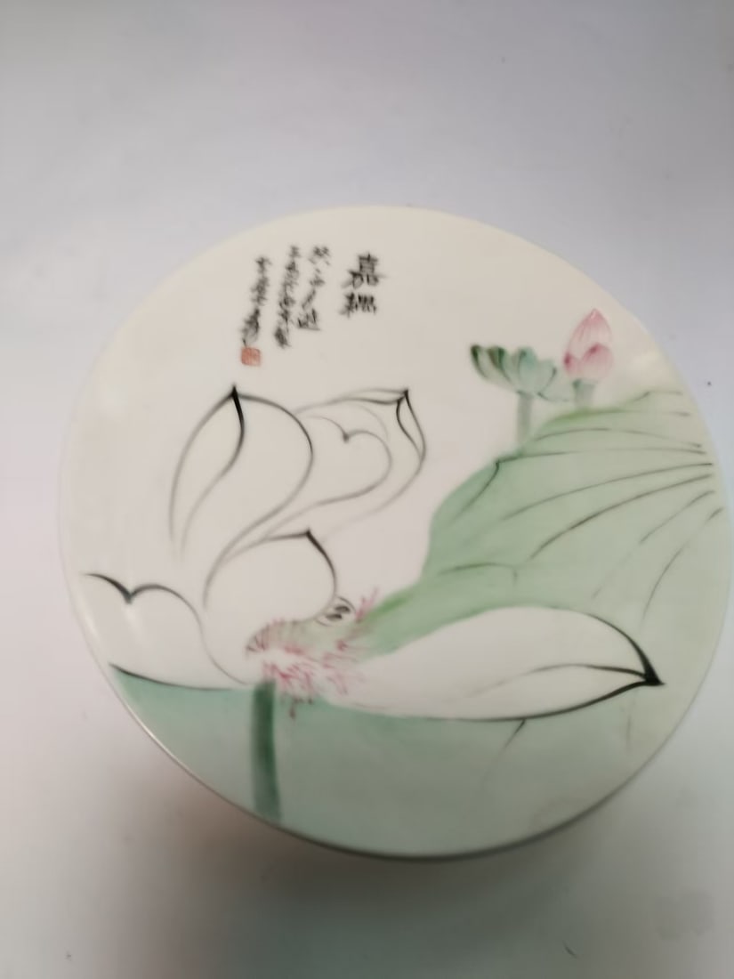 A Porcelain Plate: A Porcelain Plate. Diameter: 9.84in.