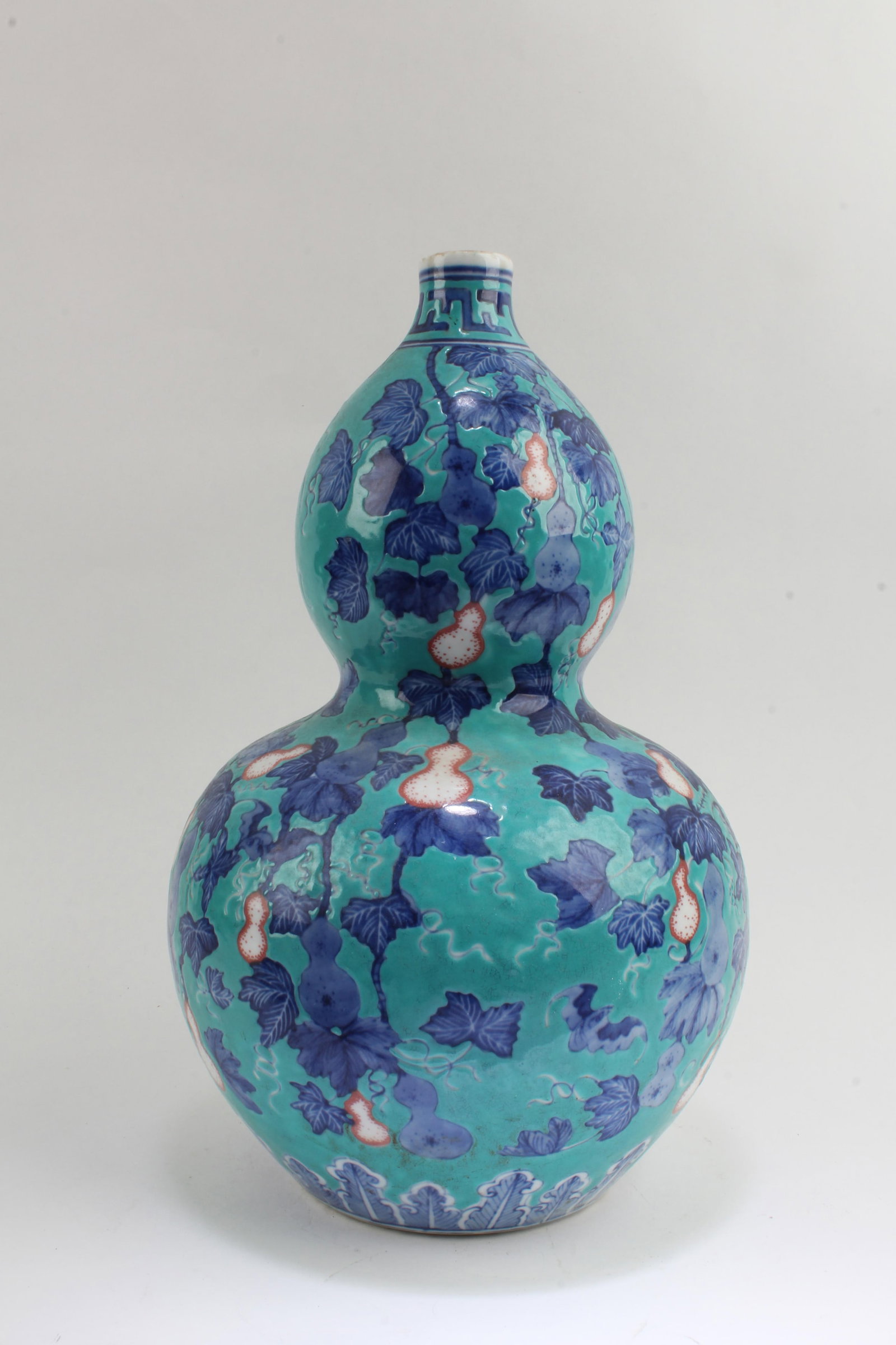 Chinese Double Gourd Porcelain Vase: Chinese Double Gourd Porcelain Vase. 'YongZheng' mark at base. Height: 11.75"