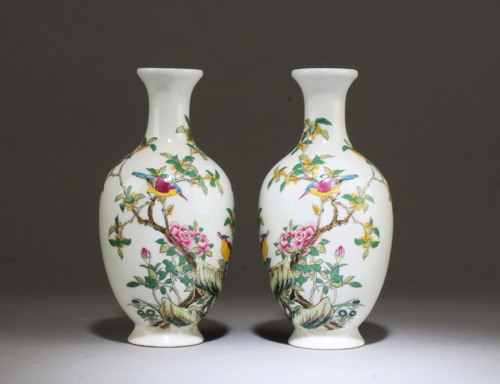 A Pair of Chinese Famille Jaune Porcelain Vases: A Pair of Chinese Famille Jaune Porcelain Vases. 'YongZheng' mark at base. Height: 8"