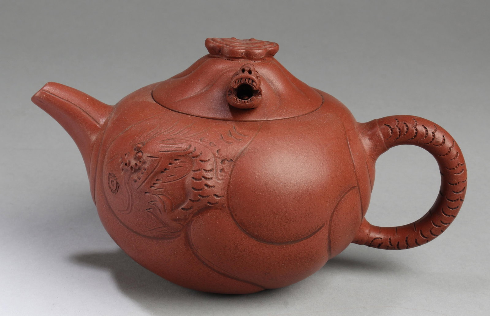 Chinese Zisha Teapot: Chinese Zisha Teapot. Length: 7.5"
