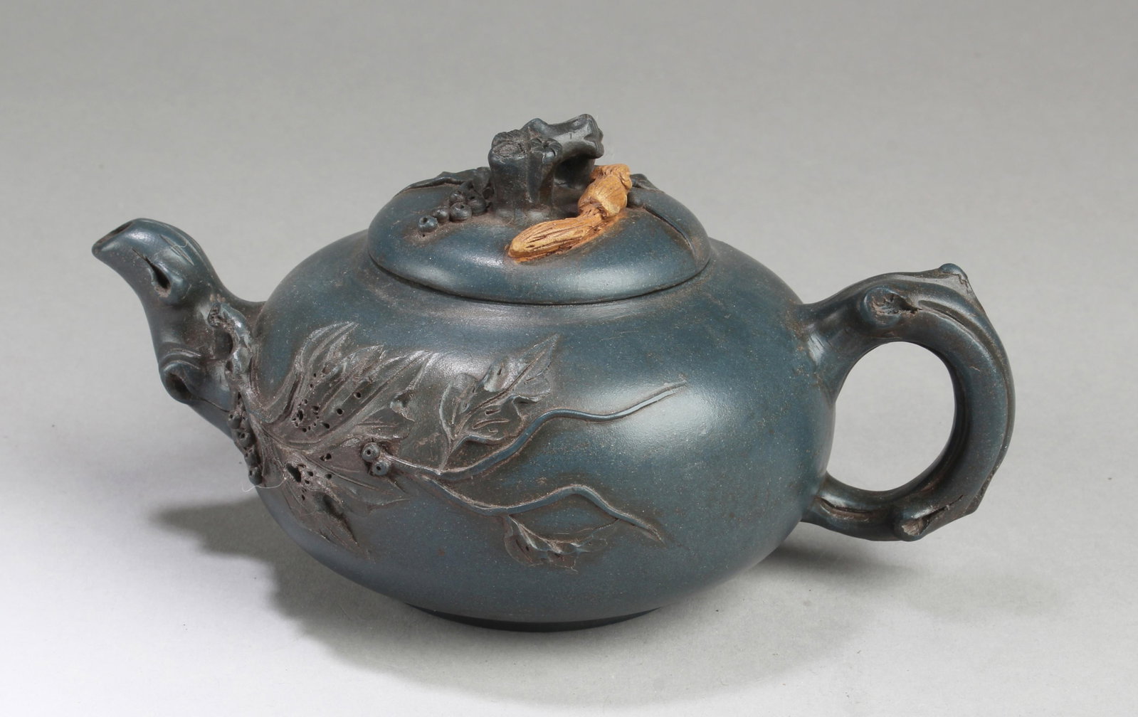 Chinese Zisha Teapot: Chinese Zisha Teapot. Length: 6.75"