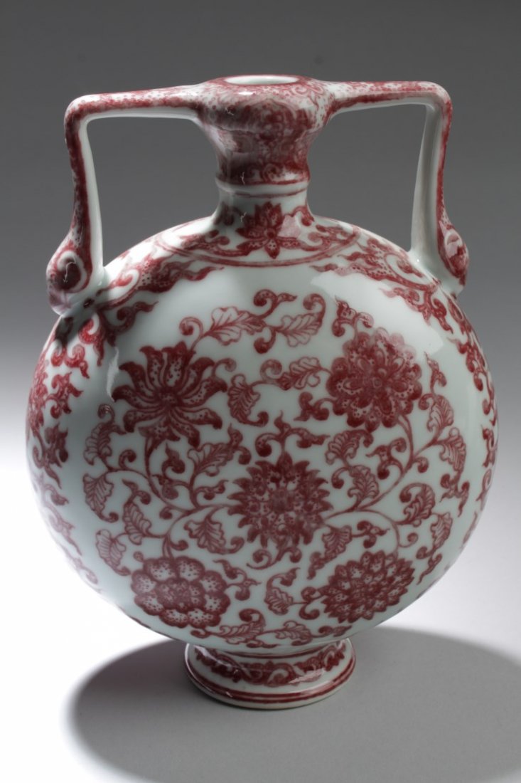 Chinese Porcelain Moon flask Vase: Chinese Porcelain Moon flask Vase, depicting flower sblossoms. 'QianLong' mark. Height: 8 "