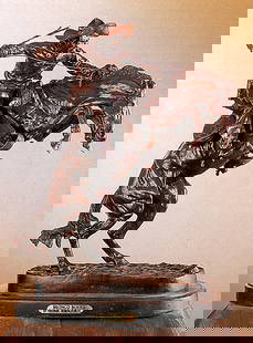 Frederic Remington Bronco Buster Bronze Sculpture: ***Bronco Buster - After Frederic Remington***Size 24x18. This is a genuine bronze sculpture created in the lost wax method and has a beautiful patina. It sits on a fine Italian marble base