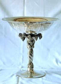 A Georg Jensen sterling silver compote bowl in the famous grape pattern number 264B, made in the 20t
