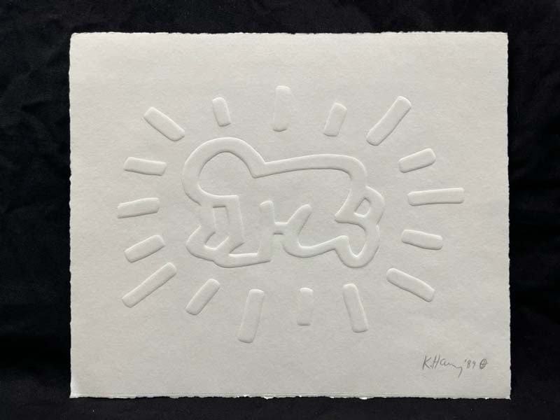 Keith Haring (American 1958-1990) Radiant Baby engraving on paper Hand signed by Keith Haring in: Keith Haring (American 1958-1990) Radiant Baby engraving on paper Hand signed by Keith Haring in pencil and dated 1989 embossedKeith Haring engraving on paper Radiant Baby Hand signed by Keith Haring 