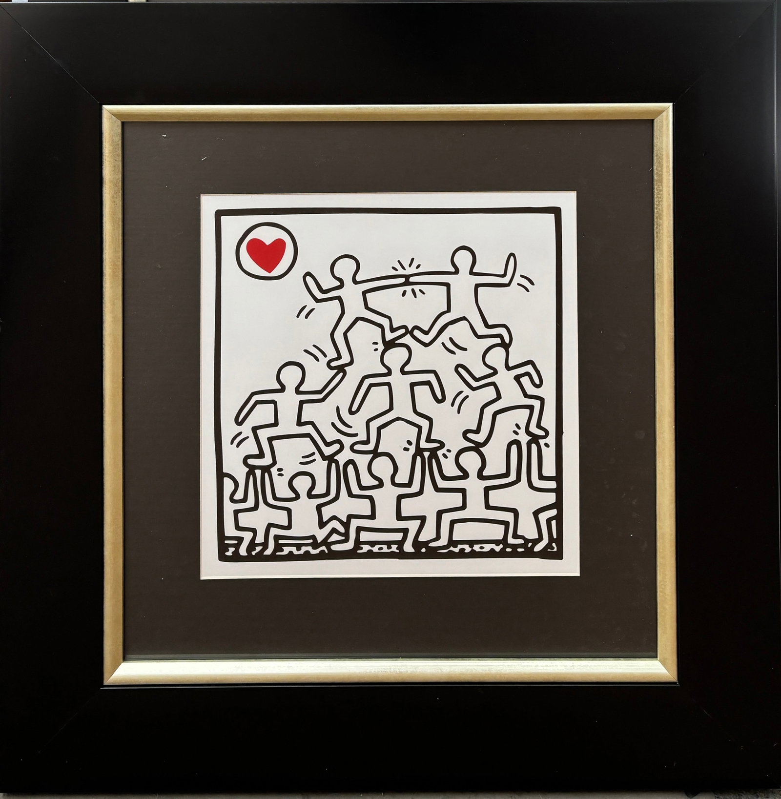 Keith Haring (American 1958-1990) Lithograph from 1984: Keith Haring (American 1958-1990) Lithograph from 1984. Approx 12x12 inches image size and 22x22 inches custom frame. Includes certificate. Art Artwork Artist.