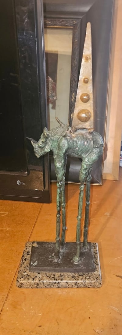 Salvador Dali (Spanish 1904-1989) Bronze Sculpture Cosmic Rhinoceros: Salvador Dali (Spanish 1904-1989) Bronze Sculpture Rhinoceros Approx 22 inches created in the lost wax method in 1956. 41 of 299. Comes with certificate of Authenticity This limited edition was cast i