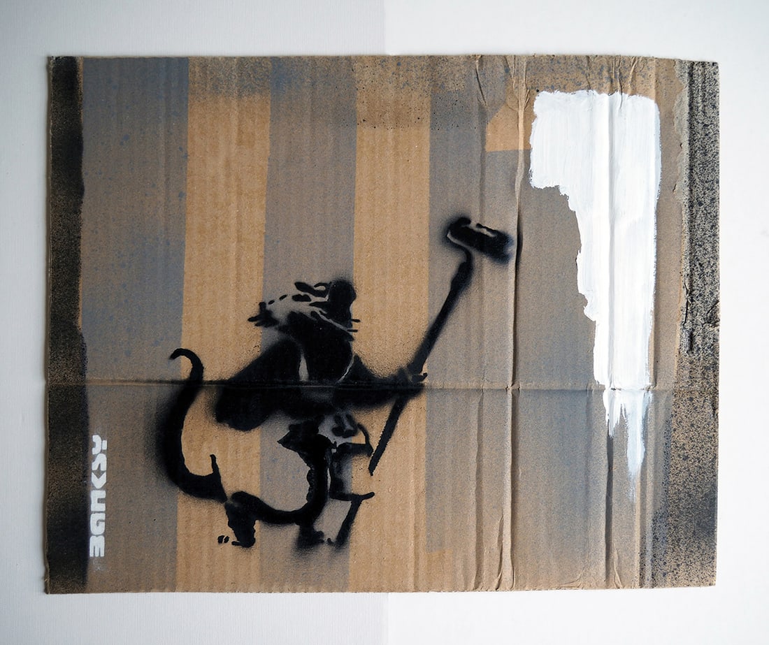 Banksy original on cardboard Painting Decorator Rat (English 1974): Original on board by Banksy (English 1974) Original on board by Banksy approx 16x14 inches image size Custom framed and includes documentation Art Artwork Artist.