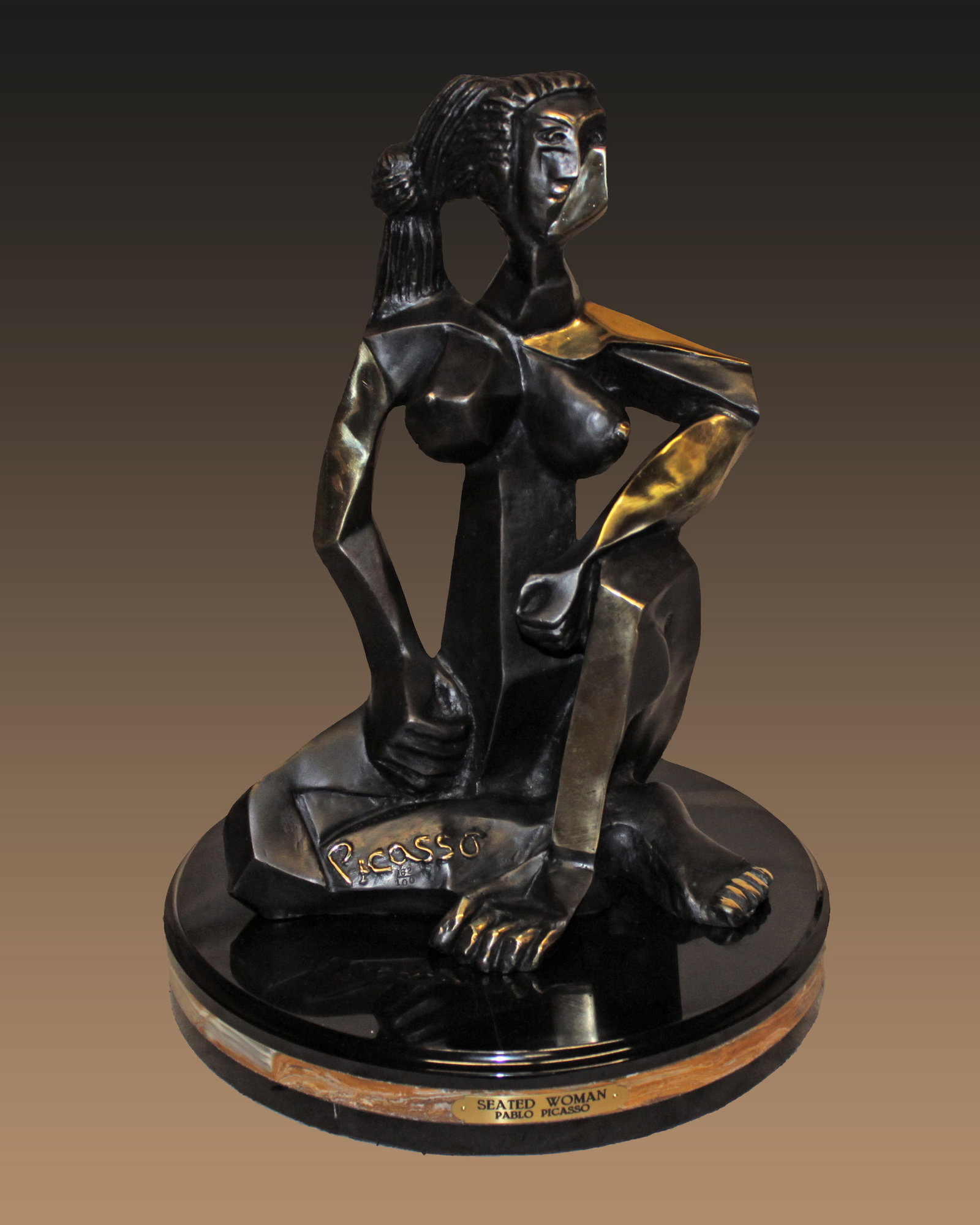 Pablo Picasso (Spanish 1881-1973) Sitting Woman Patinated Bronze Sculpture after Pablo Picasso: Pablo Picasso (Spanish 1881-1973) Sitting Woman Patinated Bronze Sculpture after Pablo PicassoPablo Picasso Sitting Woman is a High polished Bronze Sculpture signed Pablo Picasso in the cast. Approx 2