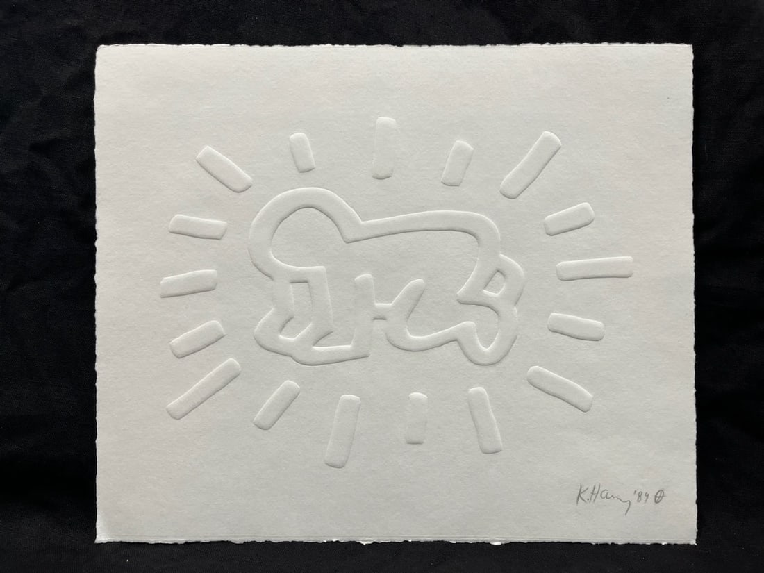 Keith Haring (American 1958-1990) Radiant Baby engraving on paper Hand signed by Keith Haring in: Keith Haring (American 1958-1990) Radiant Baby engraving on paper Hand signed by Keith Haring in pencil and dated 1989 embossedKeith Haring engraving on paper Radiant Baby Hand signed by Keith Haring 
