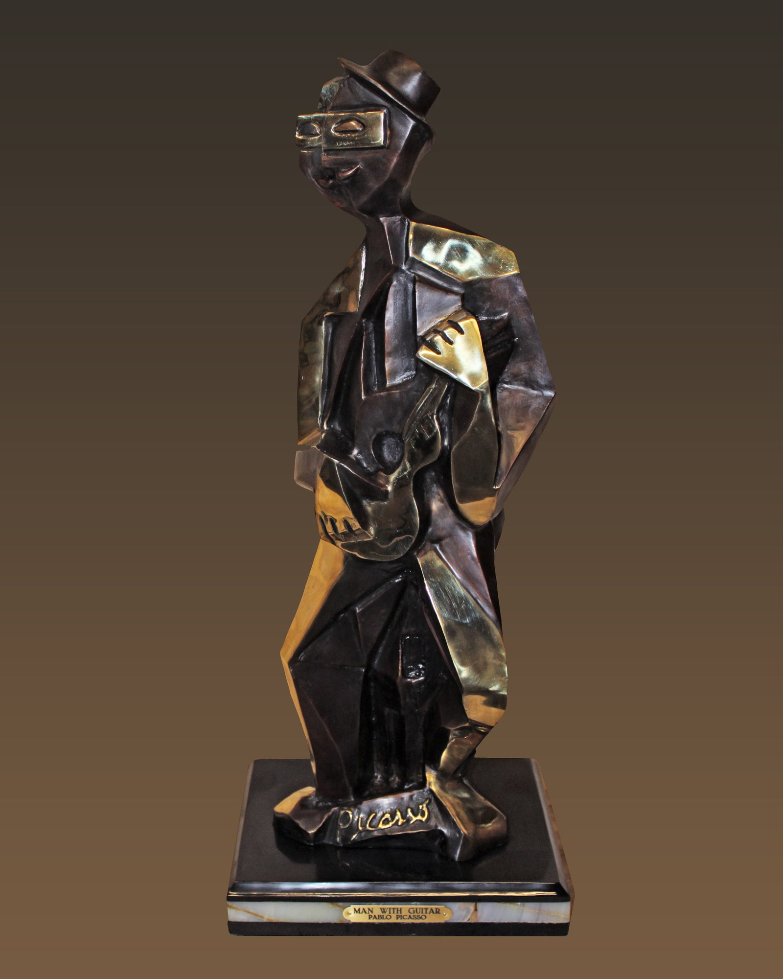 Pablo Picasso (Spanish 1881-1973) Guitar Man Patinated Bronze Sculpture after Pablo Picasso: Pablo Picasso (Spanish 1881-1973) Guitar Man Patinated Bronze Sculpture after Pablo PicassoPablo Picasso Guitar Man Patinated Bronze Sculpture. signed Pablo Picasso in the cast. Approx 30 inches tall.