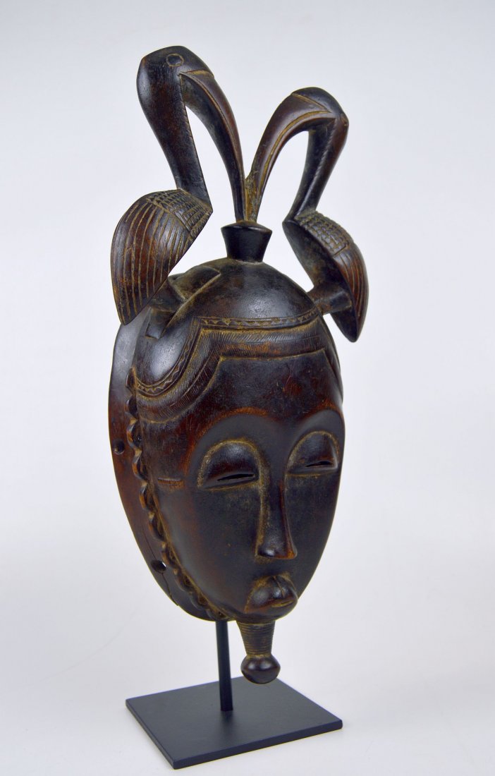 A Fine Baule African mask with Avian finial (1 of 6)