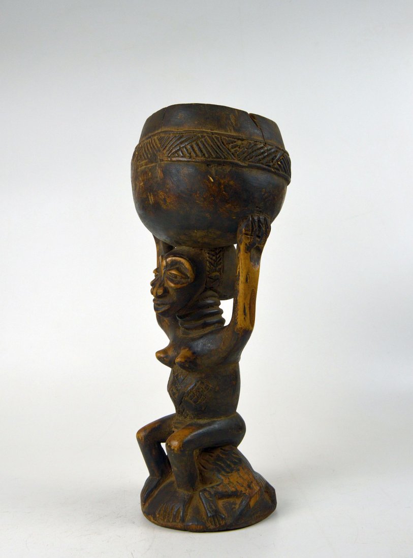 Old Luba Female figure holding bowl seated on Lion (1 of 5)