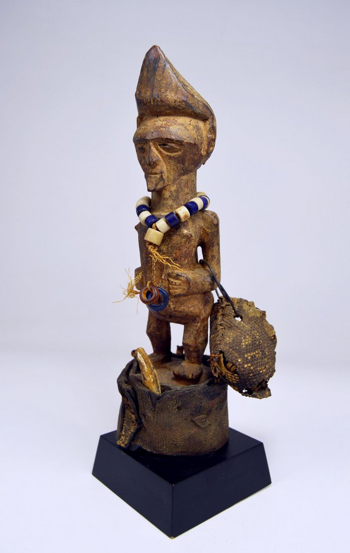 A Very Rare Old Tetela Nkishi magic fetish African Art: This is a very rare old wooden magic sculpture from the tetela peoples of the DRC / Congo, central Africa. The Tetela are a lesser known ethnic group then their neighbors the Songye among collectors, 