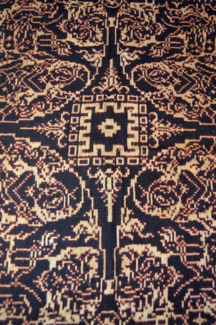 Extremely Rare Gringsing Magic Ikat Cloth From Bali: This is a Very rare and desirable example of Ikat textile from Bali, Indonesia. A Superb Geringsing wayang kebo. Field divided into semicircles by three examples of four-pointed stars. In the semicirc