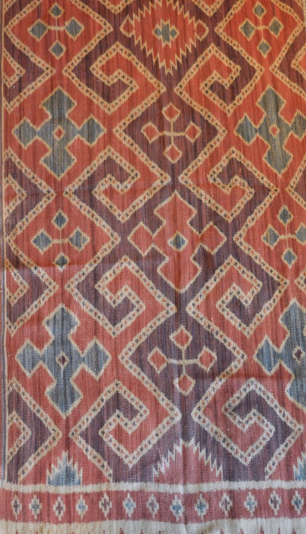 Sulawesi Seko mandi Warp Ikat Shawl: This is a vintage to antique example of Tribal made ikat from Sulawesi island, Indonesia. This is a "Seko mandi" warp ikat with geometric designs, sometimes associated with funeral rites. Measures 66 