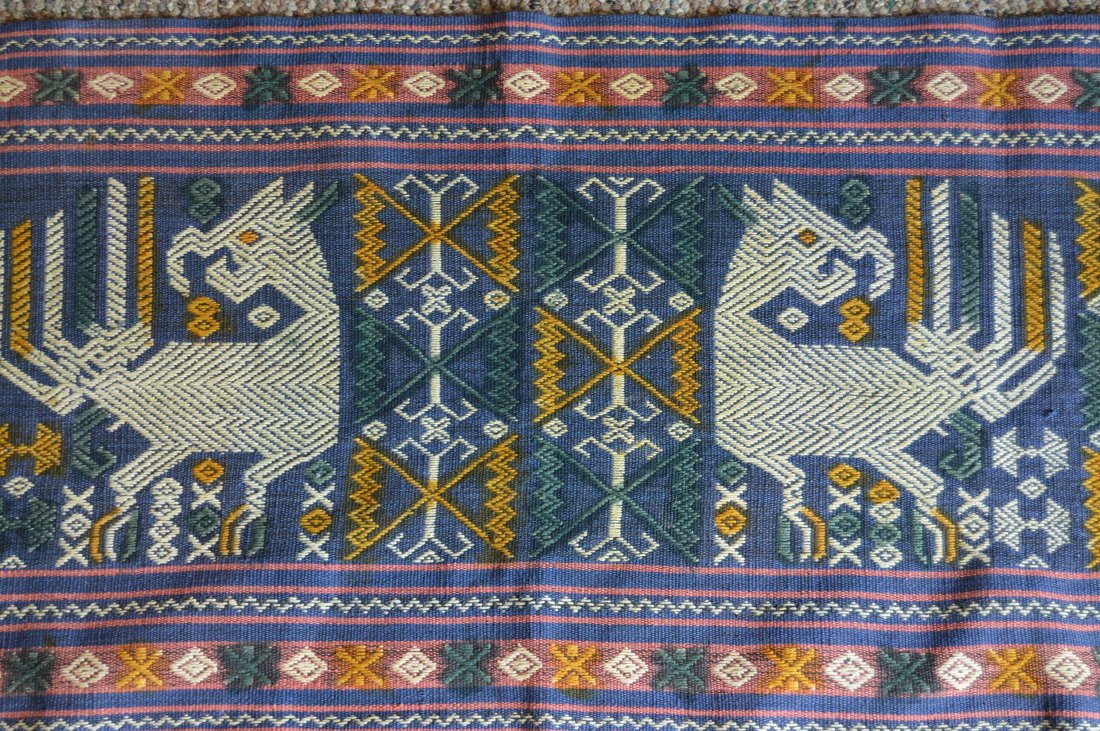 Sumba island Woven Panel with Angry Bird designs: This is a nice vintage supplementary warp ikat panel from Sumba island, Indonesia. featuring two ornate angry looking birds, possibly roosters. Measures 40 x 15 inches. Collected in the early 1980's