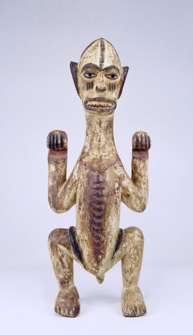 Wonderful Igbo Male Ancestor sculpture, African Art: Carved wooden male ancestor sculpture with heavy kaolin clay pigment accented with red and black mineral pigments. Likely not a very old example however aesthetically it is a very pleasing work of art
