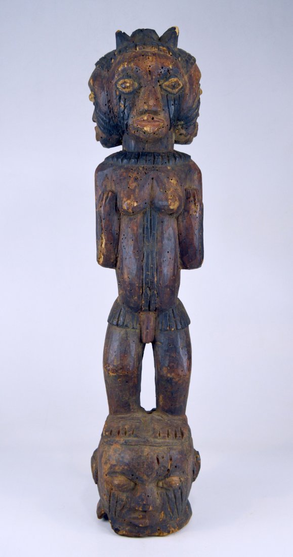 A Large Kuyu Ancestor sculpture w/ 3 faces, African Art: This is a very large wooden sculpture from the Kuyu ethnic group of the Congo, central Africa. A highly decorated and ornate example, featuring 3 ancestor faces, suggesting a protective spirit, guardi