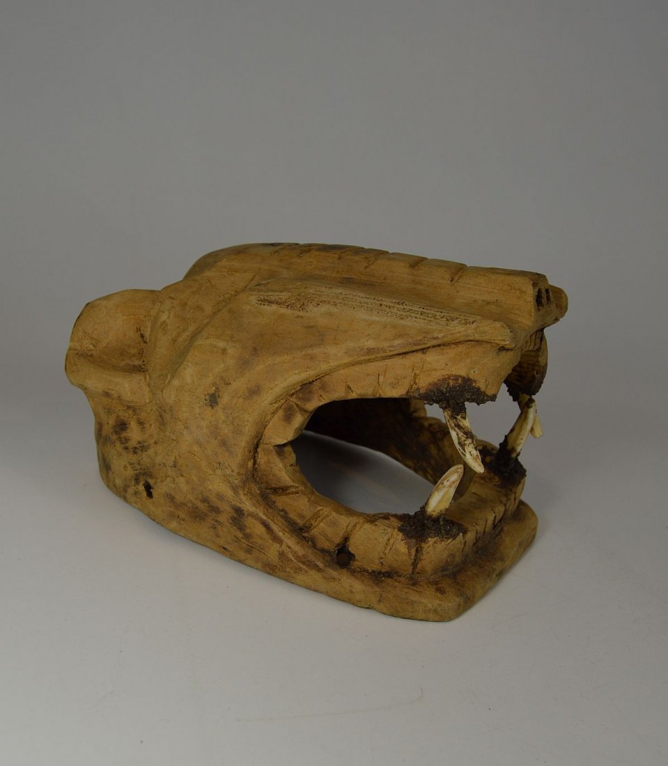 Old Mexican Folk Art Jaguar mask, Feline Folk art mask: Vintage to antique carved wooden mask in the form of a Jaguar with real teeth embedded into the mask. From an old estate sale collection. The mask measures 8.5 x 6 inches.