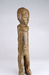 Large Old Lobi Bateba Phuwe Shrine Idol, African Art: Tall carved wooden spirit idol meant for a Shrine. Lobi peoples, Burkina Faso, West Africa. carved from a single piece of wood with obvious weathered and wear. The Statue was known as a "Bateba Phuwe"