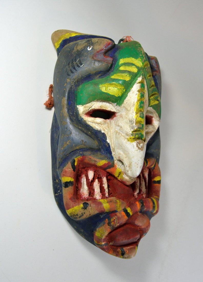 Art Brut Costa Rica Folk Art mask of Hideous Monster: Carved wood and painted folk art mask from Costa Rica,Central America. Signed by artist " Jeffery Rc Jos" The mask measures 12 x 8 inches.