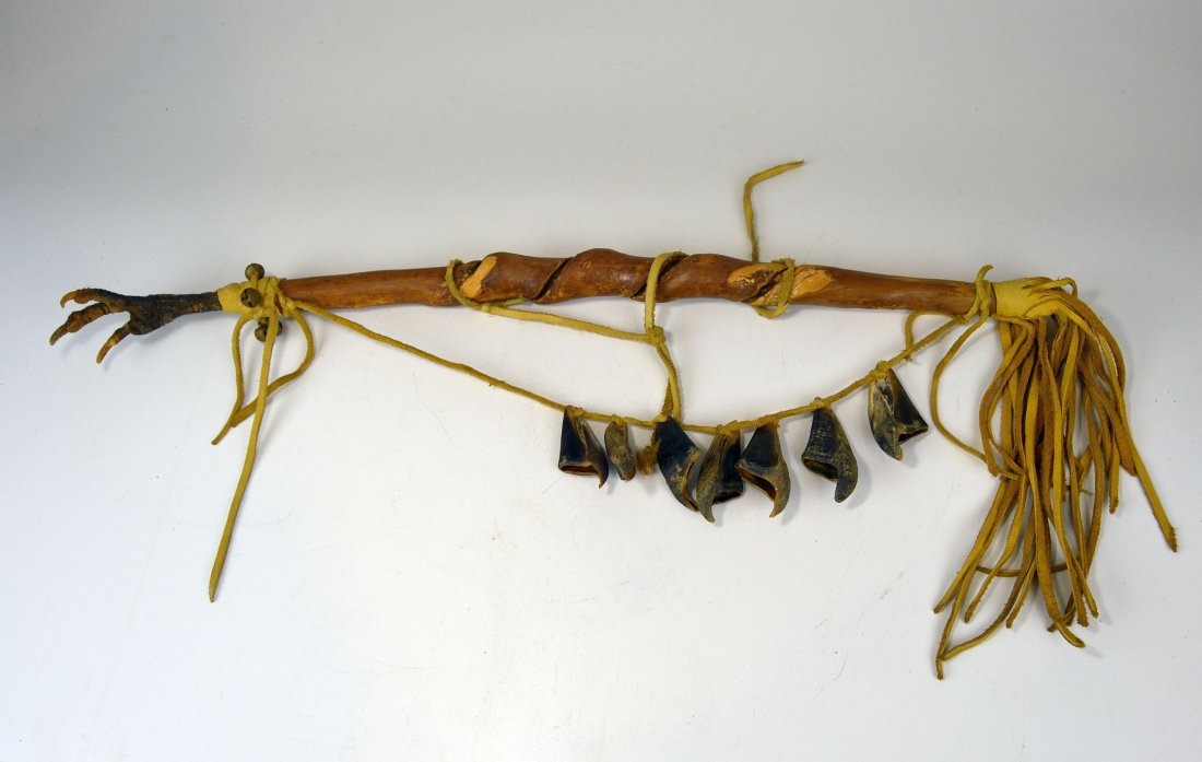 Native American Turkey Claw Magic staff: Unknown Tribe ~ Native American Turkey Claw foot club or staff with hoofs attached as rattles and decorative leather work fringe. The Staff was made from a twisted piece of wood. Measures 25 inches lo