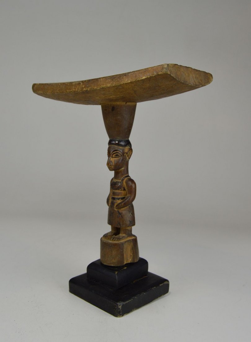 Antique Yoruba Headrest with female ancestor, African: Very old carved wooden head rest from the Yoruba Of Nigeria, West Africa. featuring a female ancestor spirit and some incided designs. Mounted to wooden base. Measures 10.5 x 8 inches.