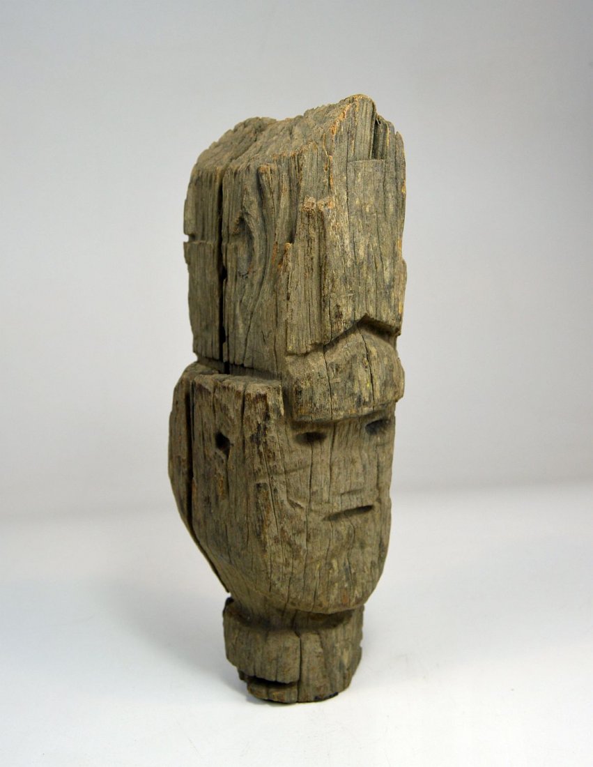 Archaic Nepal guardian statue head, Ancient Tribal Art: This is a very old wooden ancestor shrine sculpture head from Western Nepal. Such sculptures were placed on bridges, at crossroads and placed on shrines and fresh water springs as protection from evil
