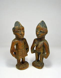 Old pair of Yoruba Ibeji twin Idols, African Art: old carved wooden pair of Ibeji twin idols from the Yoruba of Nigeria, Africa. A primitive and folk style not commonly found.