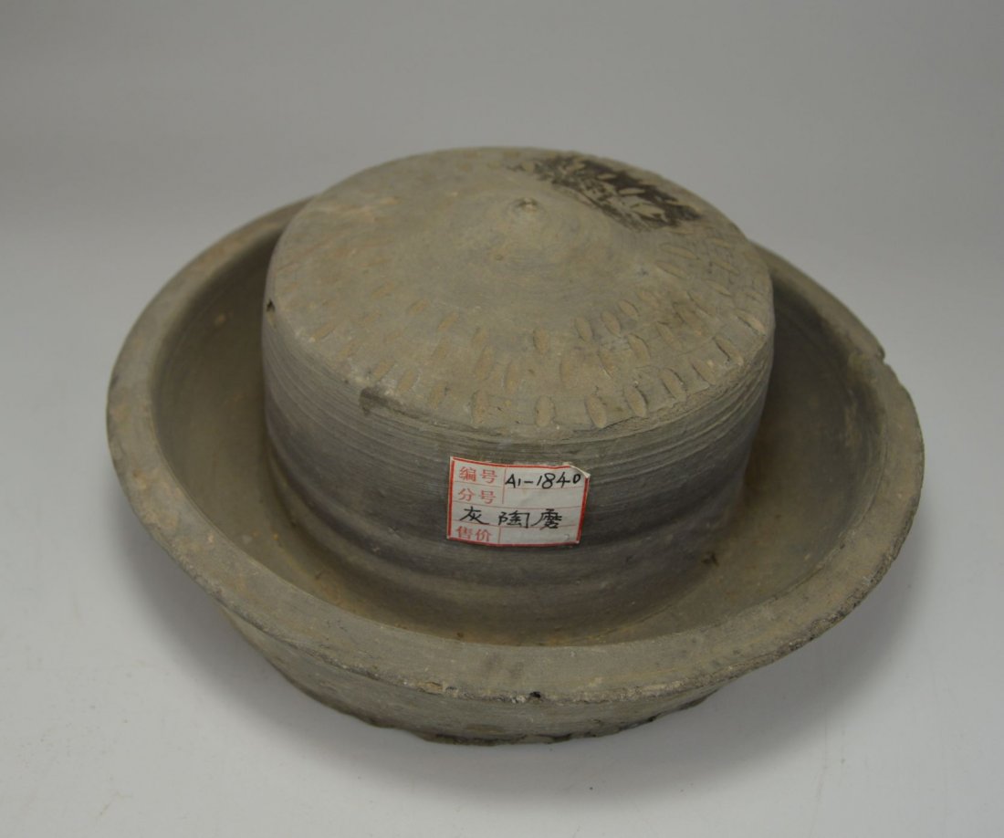 Han Dynasty terracotta ritual vessel: This is a terracotta ceremonial vessel, possibly dating back to the han Dynasty, 206 BC - 220 AD. Unusual form , appears to be a central raised cylinder with channel around outer edge for water. exact
