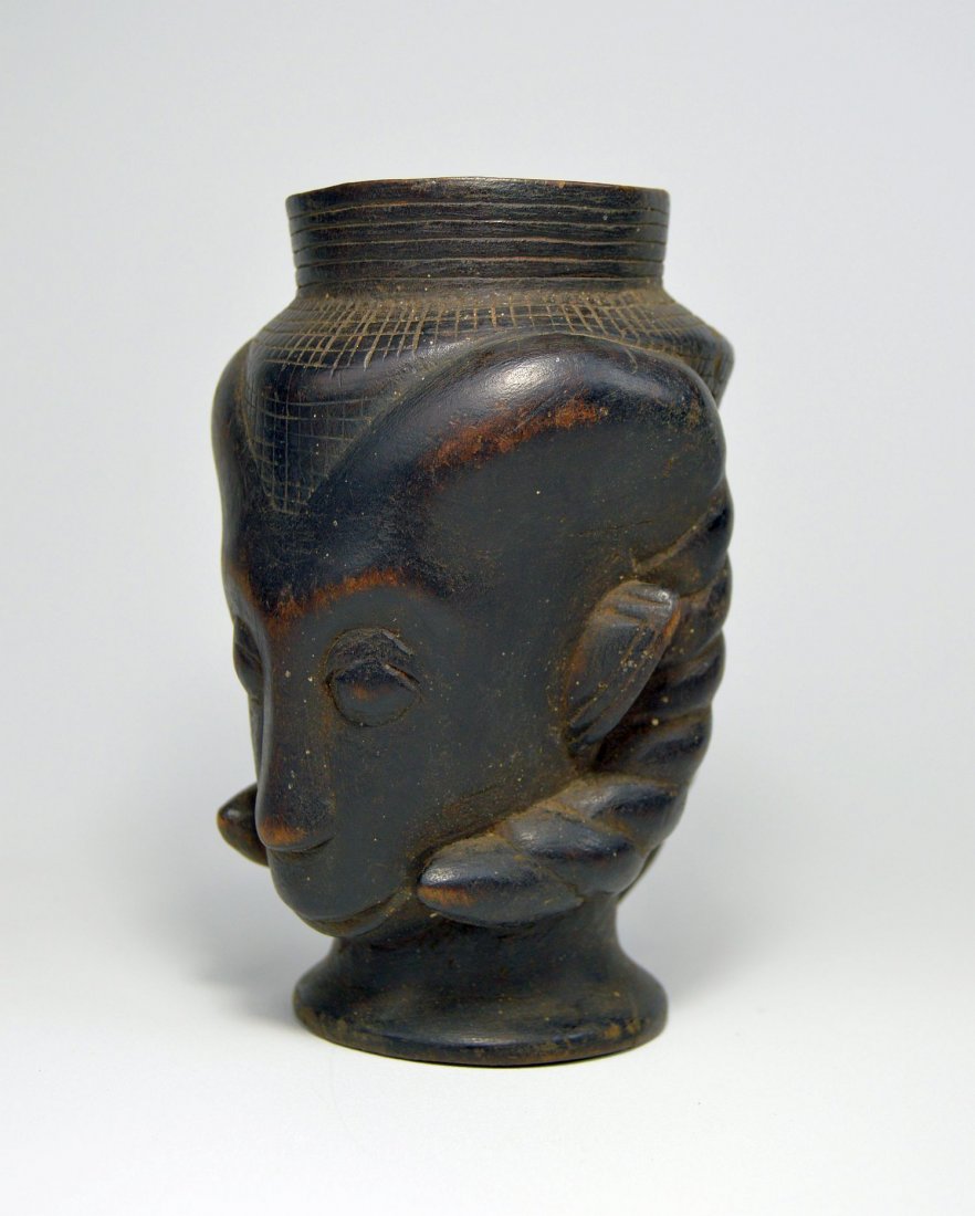 Vintage Kuba Palm Wine Cup with Rams Head, African Art: Older carved wooden cup in the form of a rams head with incised linear designs. Kuba peoples, Congo, central Africa. Measures 6.5 inches tall.
