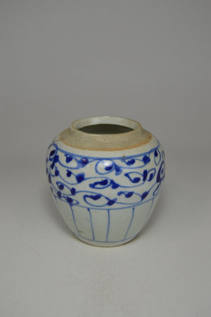 19th Century Blue & White Ginger Jar with Floral motif: A 19th century Chinese Ginger Jar with with floral motif. A very old ceramic appears to be a 19th century example and was possibly unearthed. Measures inches