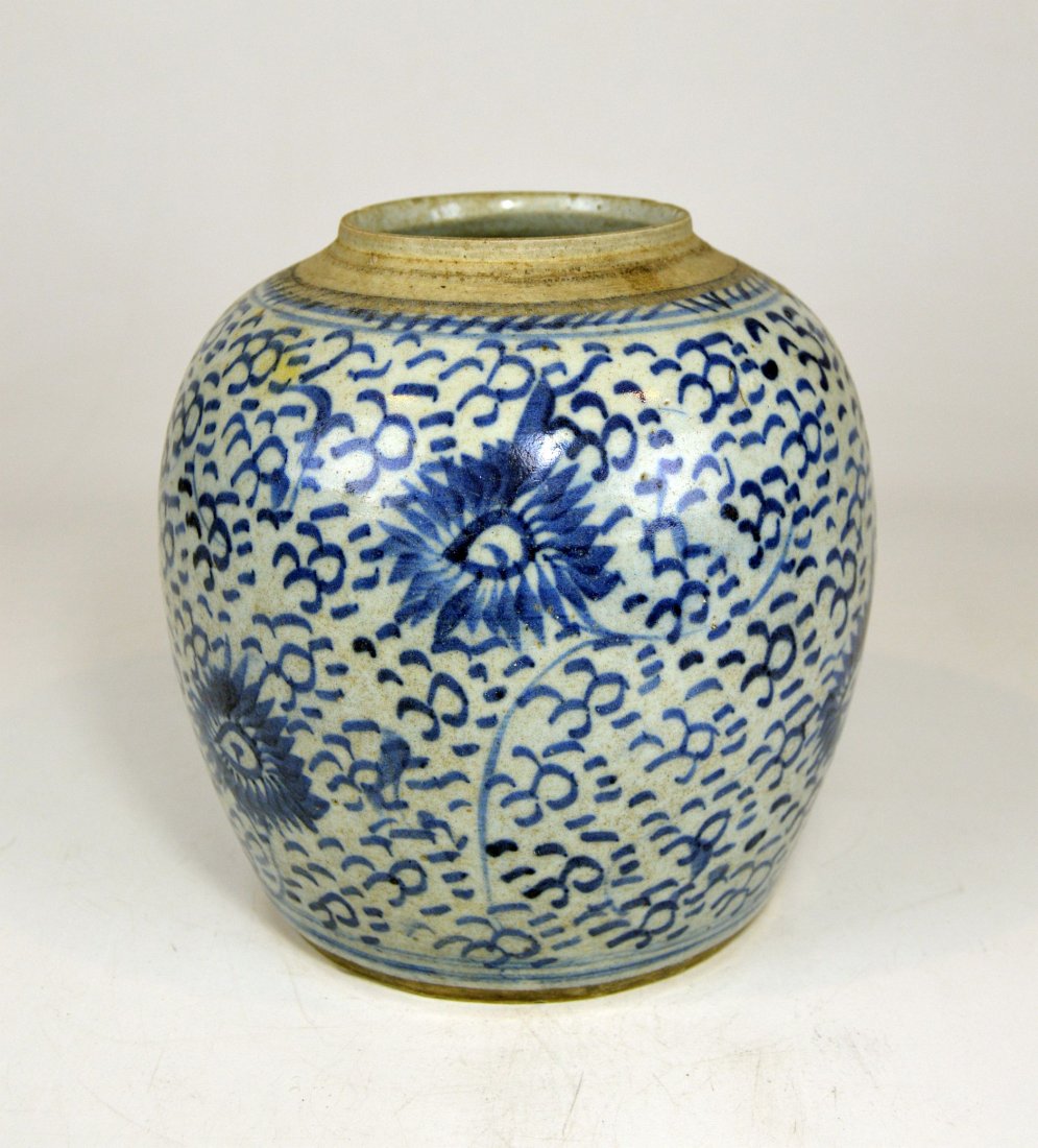 A 19th Century Blue & White Ginger Jar w/ Floral motif (1 of 5)