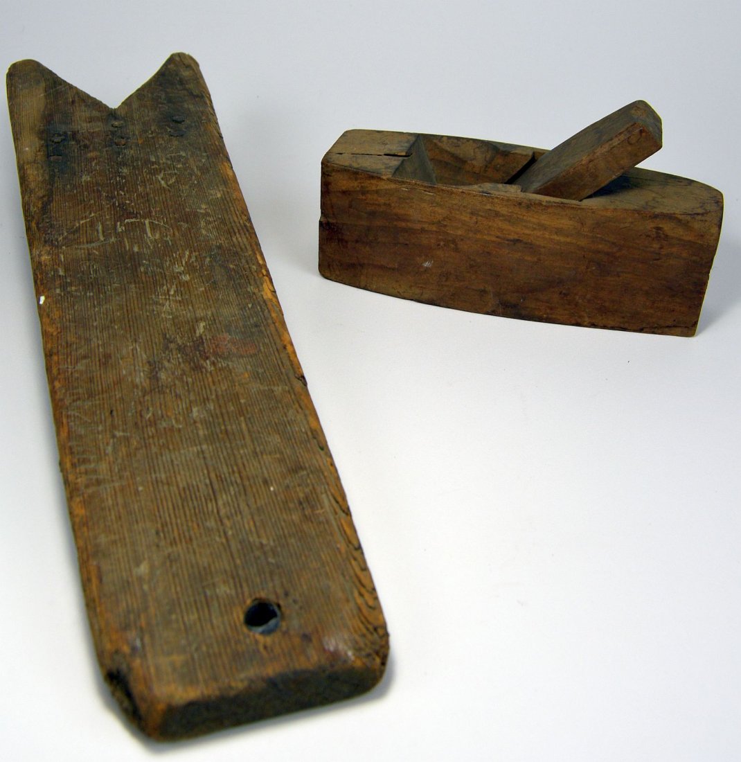 Set of 19th century Wooden tools, American Folk Art: Authentic pair of Old wooden tools from the 19th century, Likely from Pennsylvania. The Taller is possibly for shoeing horses and measures 18 inches, the smaller is a old wood planer.