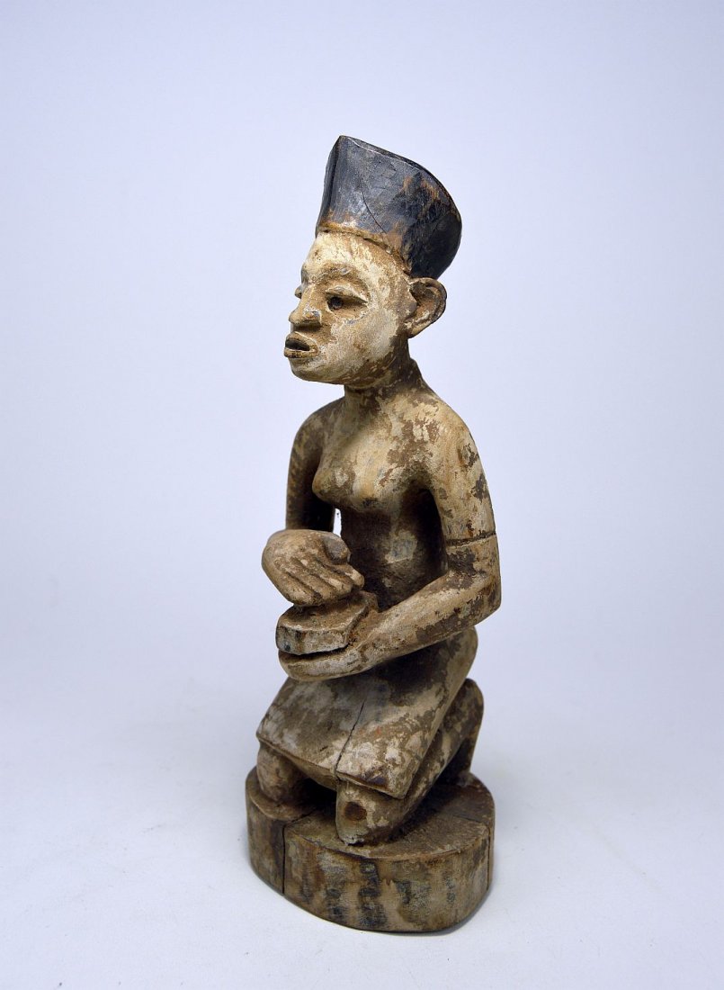 A Kongo kneeling Female devotee sculpture (1 of 6)