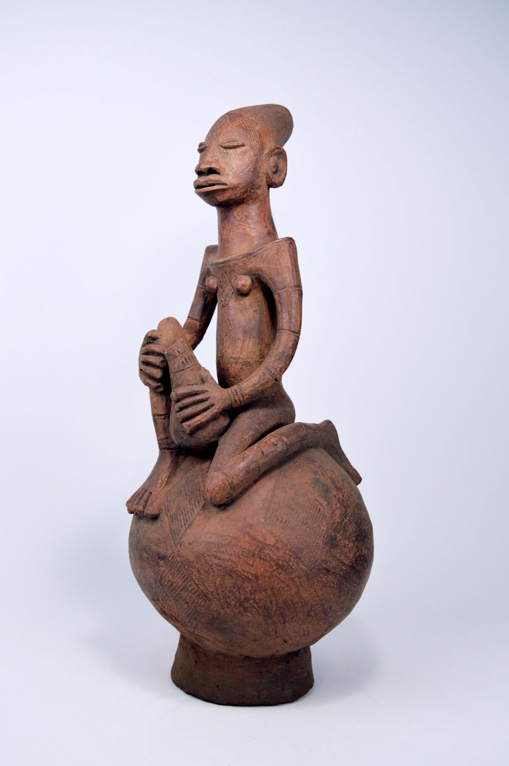 A Large Mangbetu Terracotta Pottery vessel with Female (1 of 6)