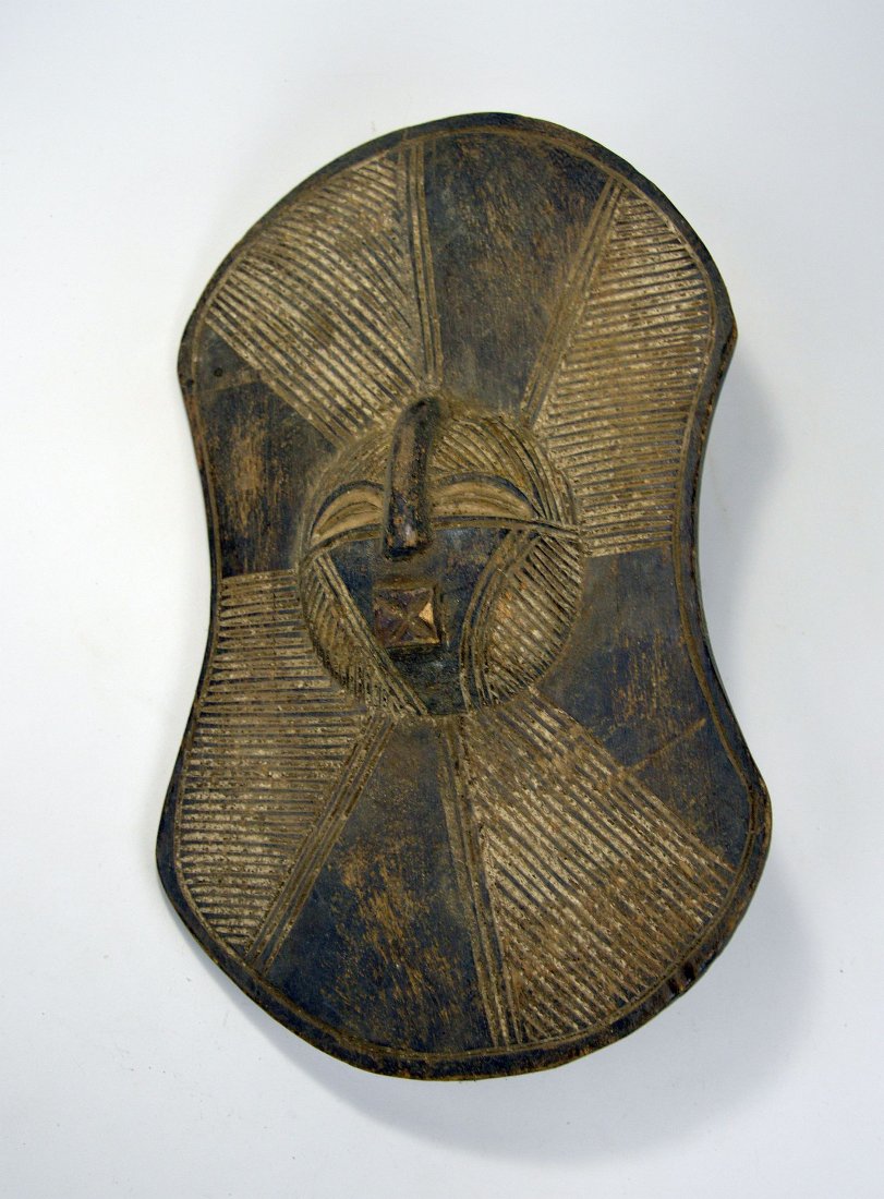 A Songye Dance Shield with mask face (1 of 5)