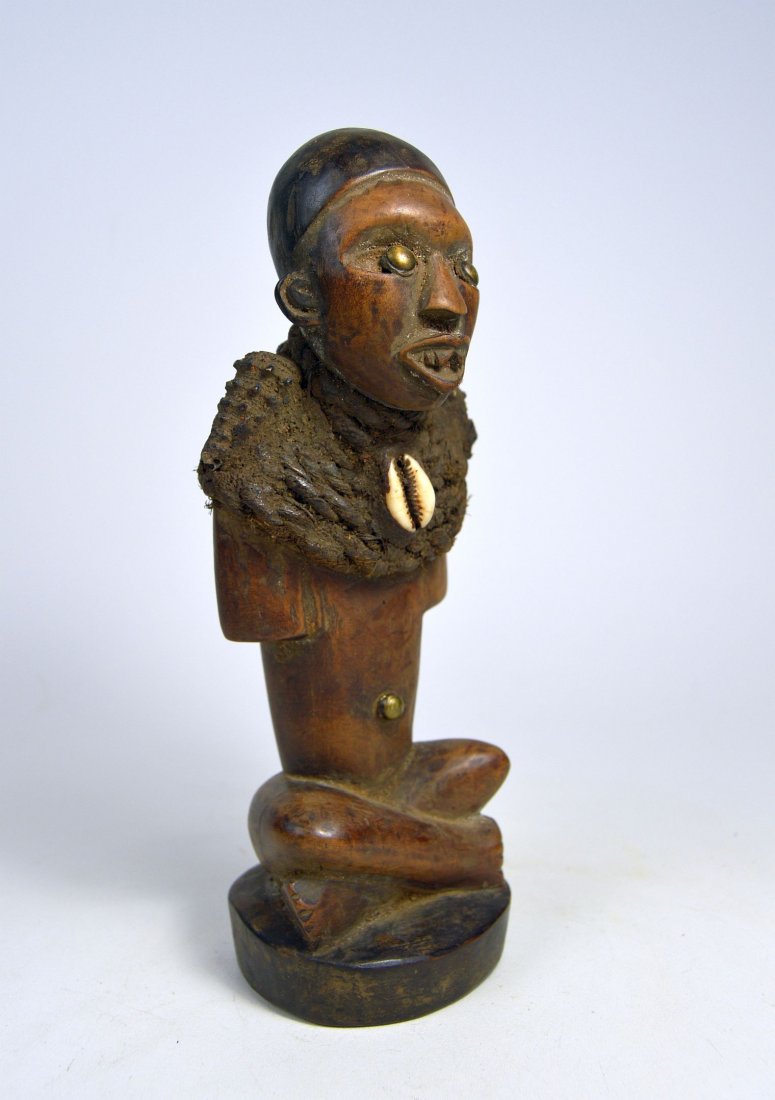 Kongo magic fetish with snail shells (1 of 7)