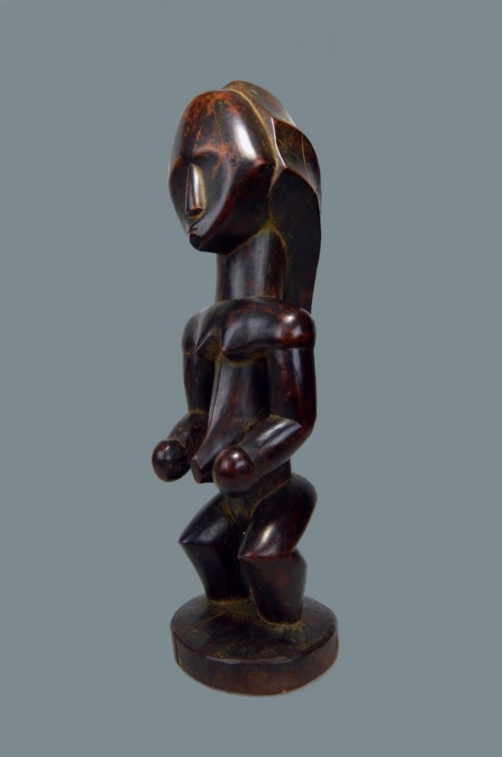 Fine Contemporary Fang Byeri Ancestor sculpture: A very fine Byeri sculpture from the Fang peoples, Gabon, Africa. Carved wooden female idol with a highly stylized "minimalist" style and overall modern aesthetic. This sculpture is not too old, perha