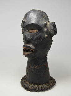 A Ekoi / Ejangham Skin covered headdress African Art: A Haunting carved wooden and basketry headdress in the form of an ancestor head that has been covered in animal skin. Ekoi or Ejangham peoples, Cross River region, Nigeria, Africa.