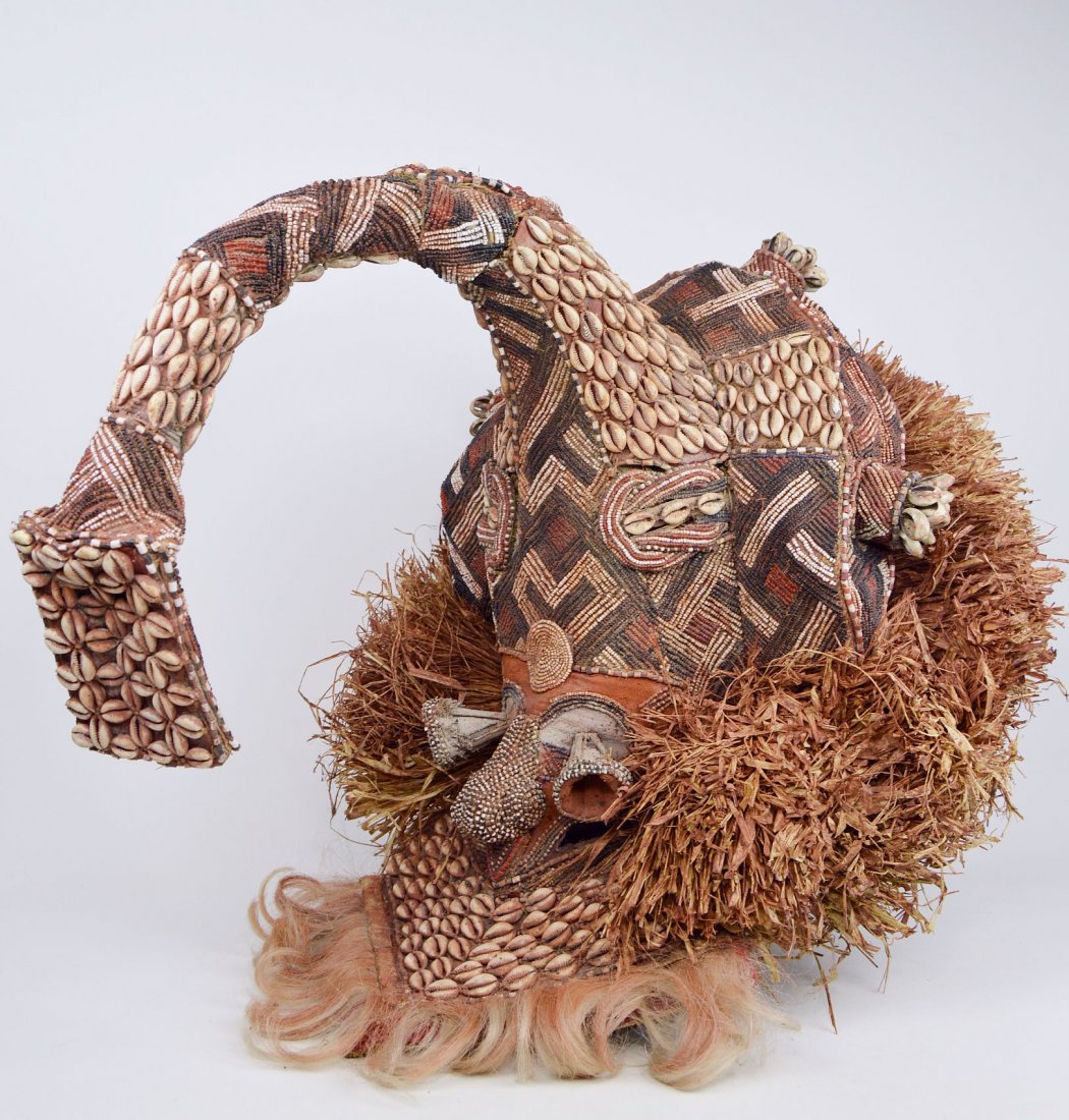 A Fantastic old Kuba Mukenga Elephant Mask, African Art: A very large and elaborate example of a Mukenga elephant mask with ornate beadwork and design. Kuba peoples, Congo, central Africa. A metal display stand can be included for an additional $34.00