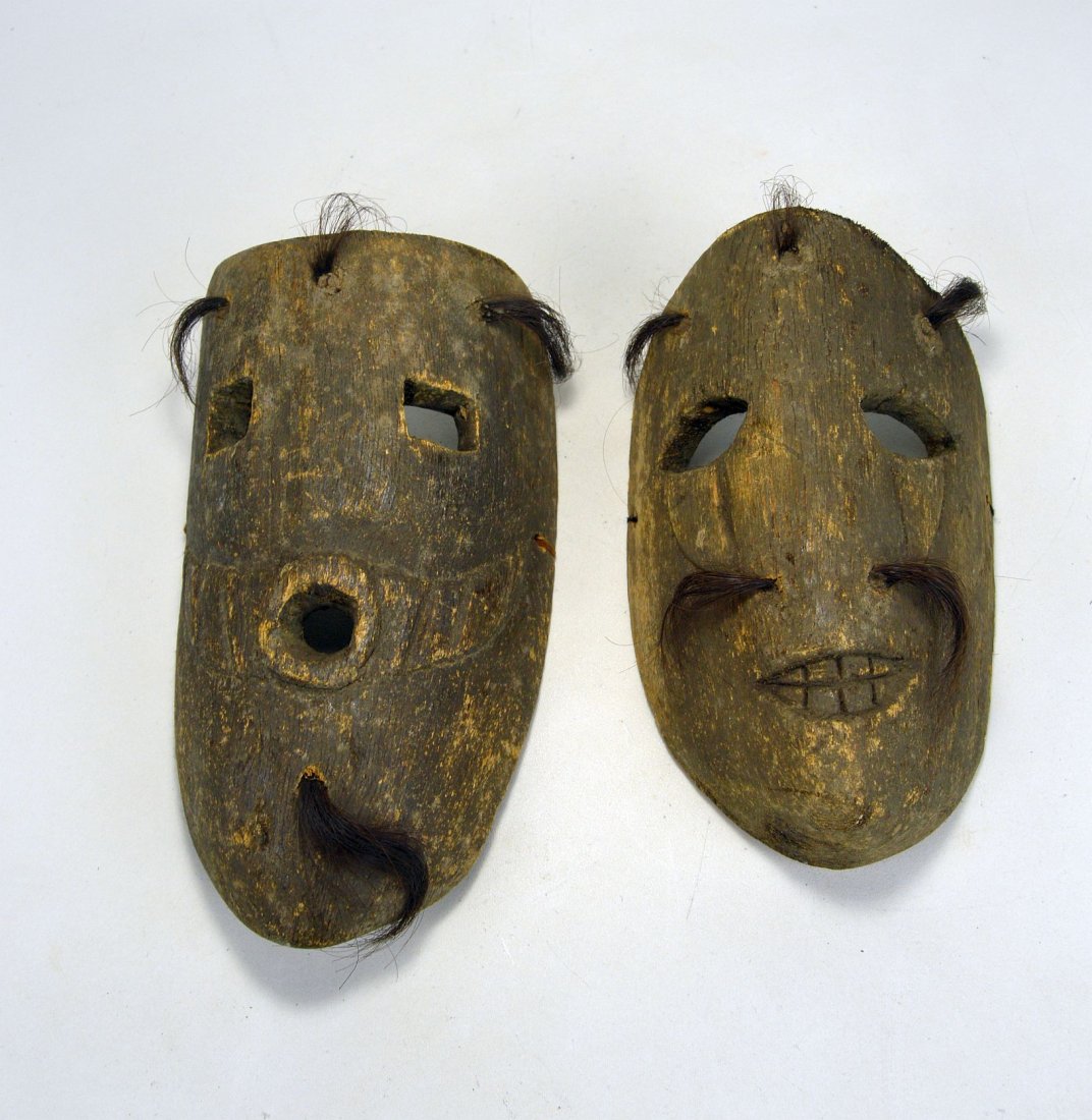 A Pair of Guatemalan Folk Art masks (1 of 4)